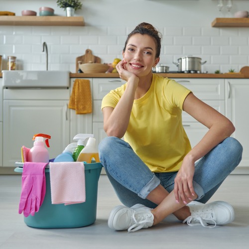 maid sitting with bucket